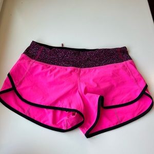 Pink LuLu Lemon athletic shorts in great condition. Size 4.